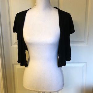 Black shrug